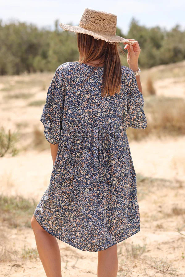 Model wearing Navy Blue Liberty Print Flowing Smock Dress - back