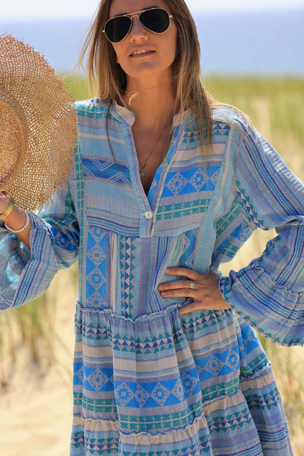 Blue frilled cotton dress with woven aztec print