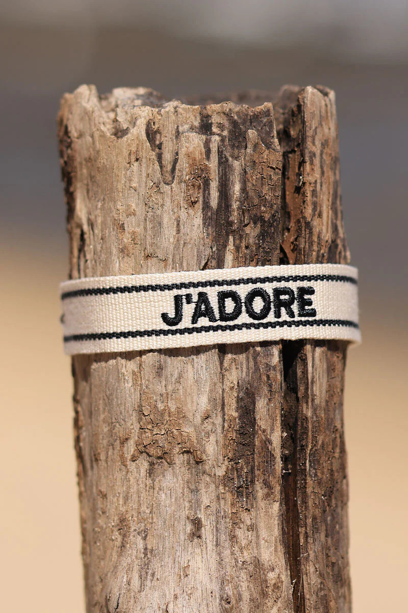 Ecru fabric bracelet with black 'J'adore' embroidery