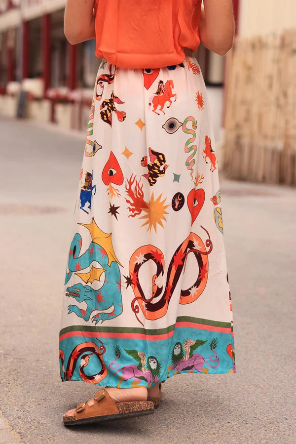 Off white floaty skirt with slit and colorful symbols zodiac signs print