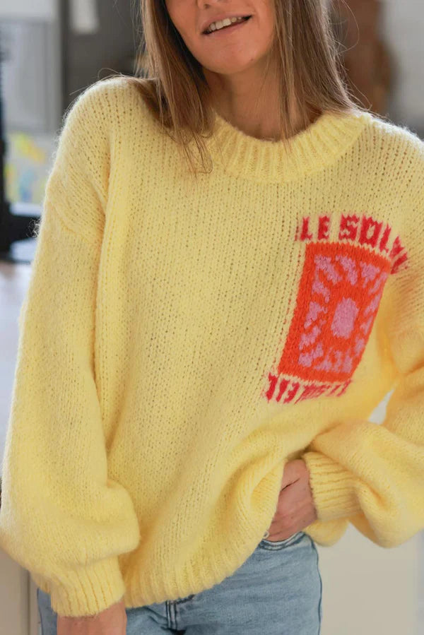 Pastel Yellow Chunky Knit Sweater with Vibrant Sun Embroidery