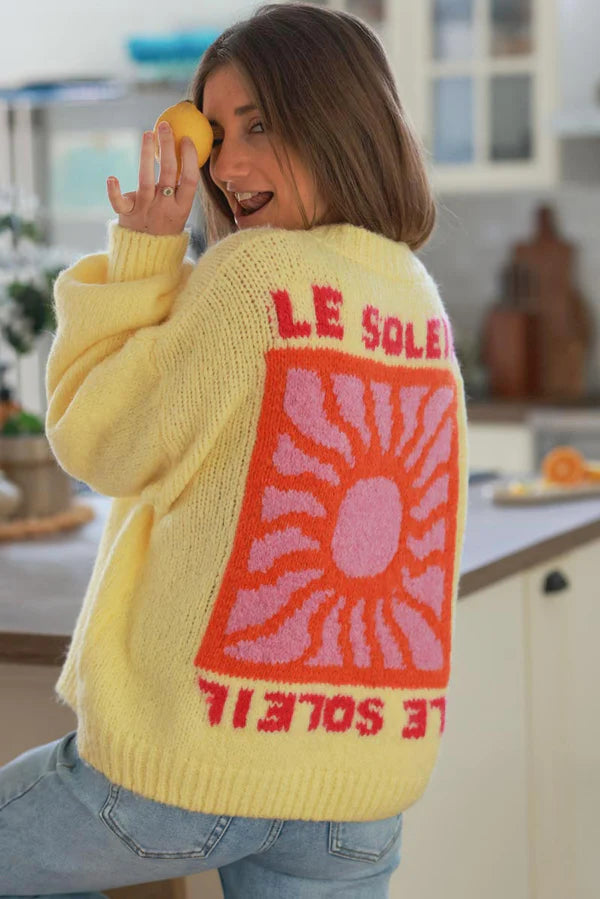 Pastel Yellow Chunky Knit Sweater with Vibrant Sun Embroidery