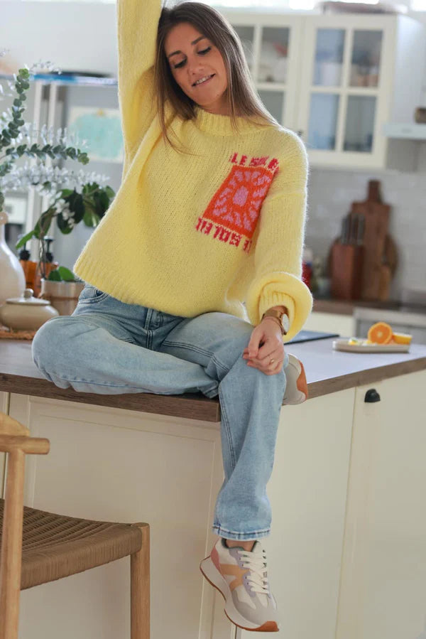 Pastel Yellow Chunky Knit Sweater with Vibrant Sun Embroidery