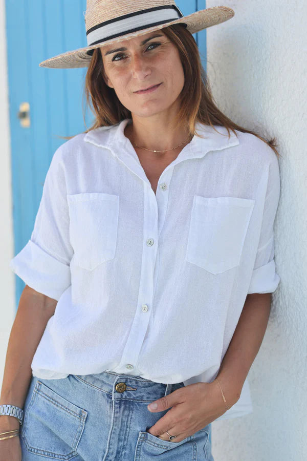 White soft cotton blouse with 3/4 sleeves and large pockets