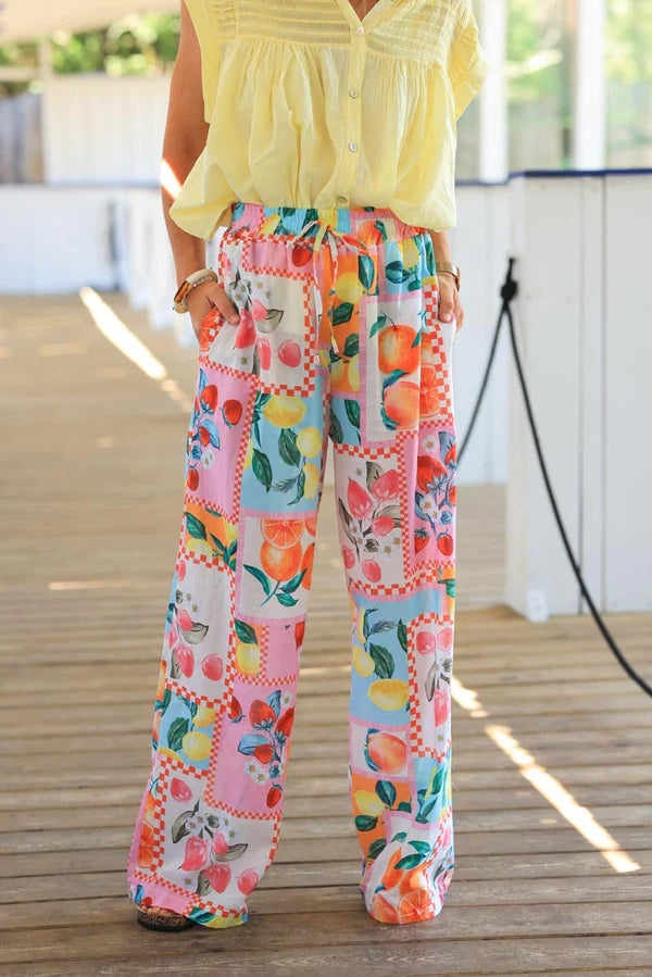 Wide leg floaty colorful pants with summer fruit print